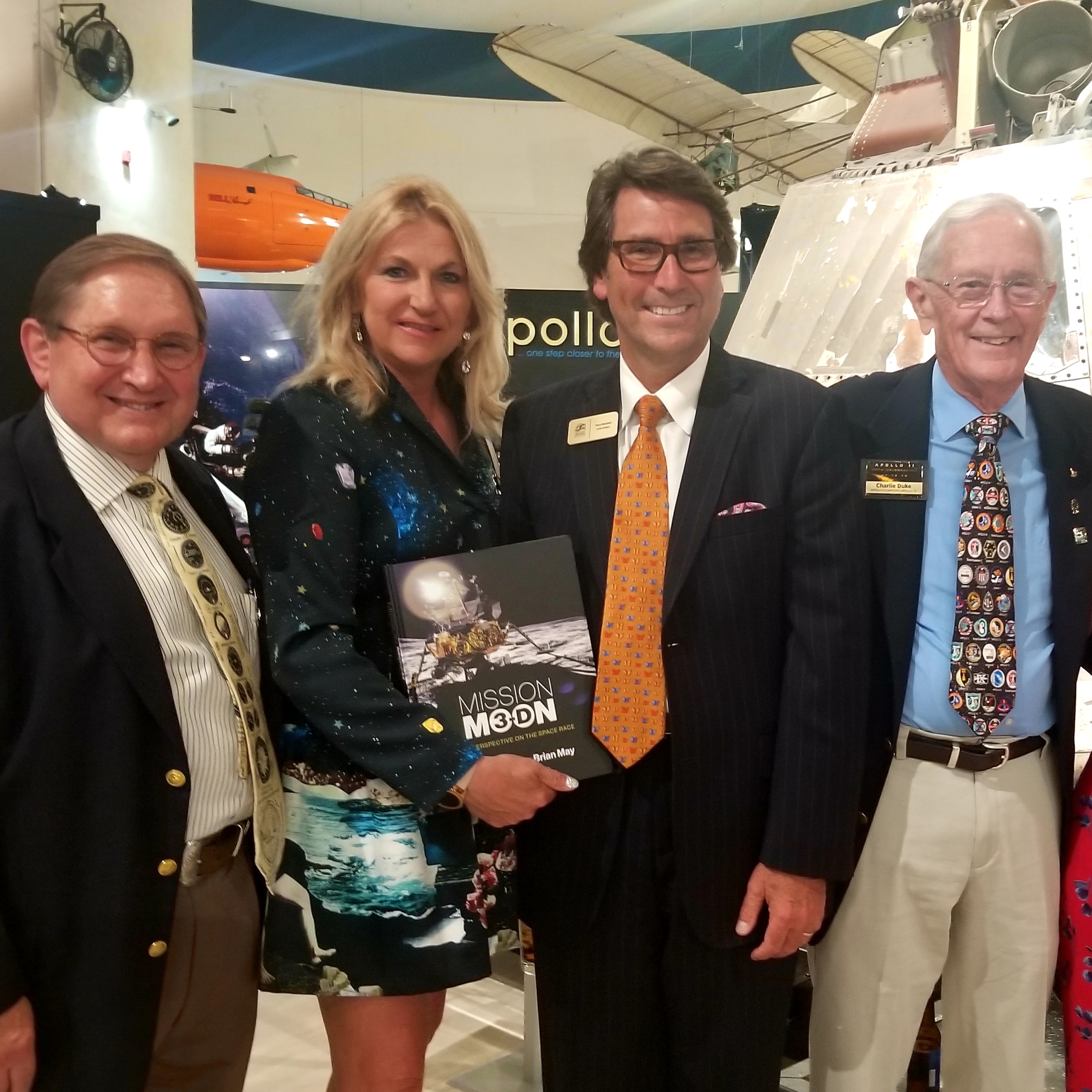 Dr. Perry and Judith Mansfield with Apollo 11, Charlie Duke, and CEO James Kidrick.