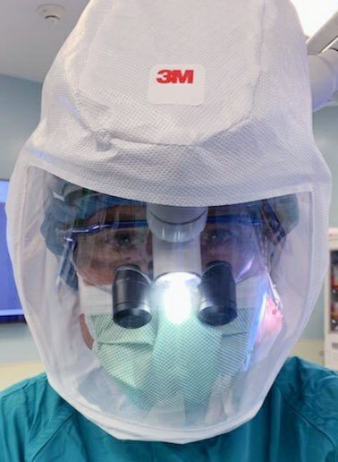 Dr. Perry Mansfield in full surgical gear for operating on COVID patients
