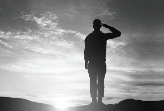 Silhouette of Saluting Soldier
